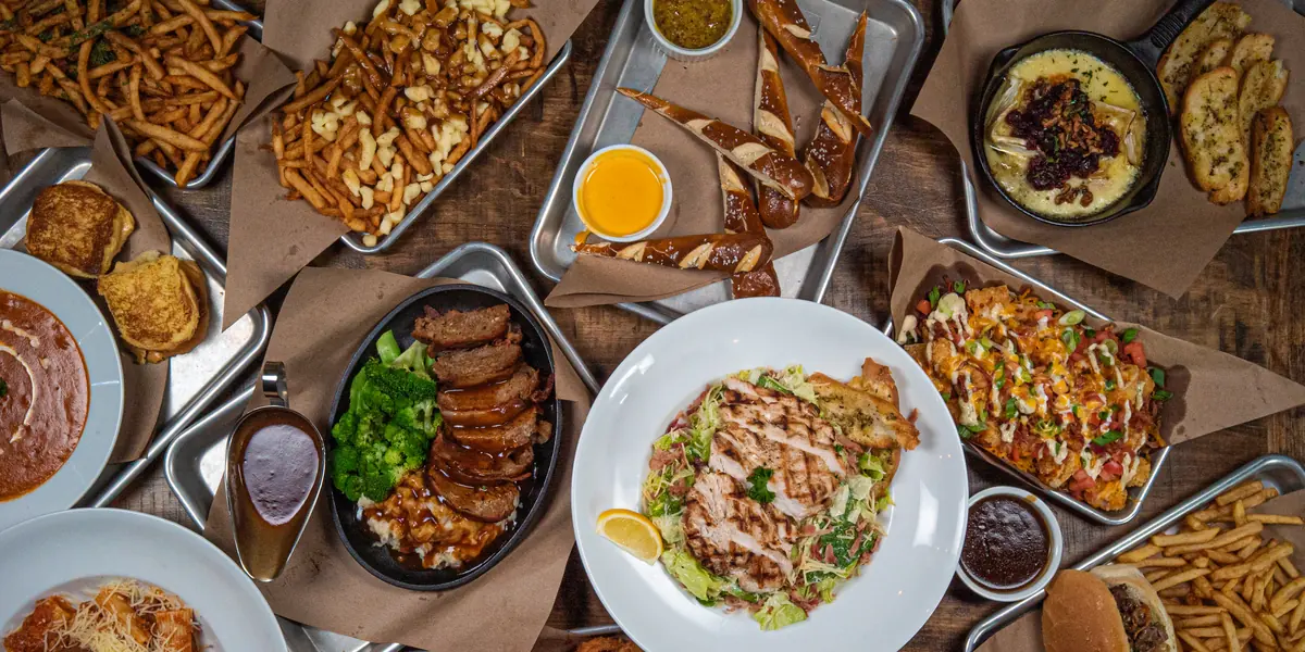 An overhead spread of Perfect SZN dishes ready to share