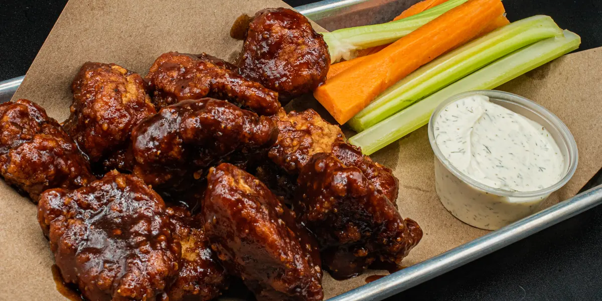 A tray of saucy Perfect SZN wings